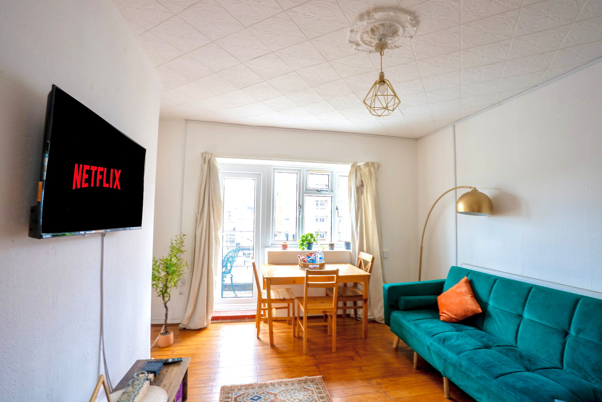 The Gold Apartment — Living and dining area